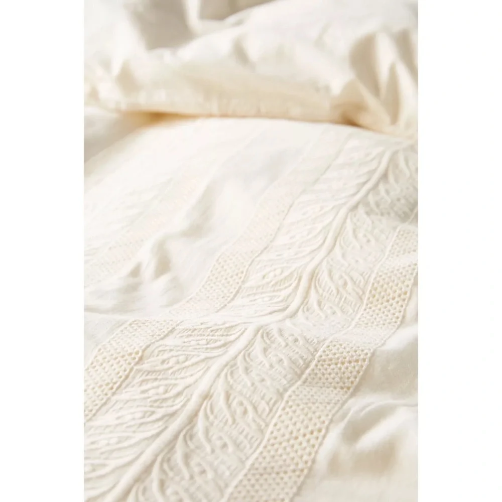 Anthropologie embellished flourishes