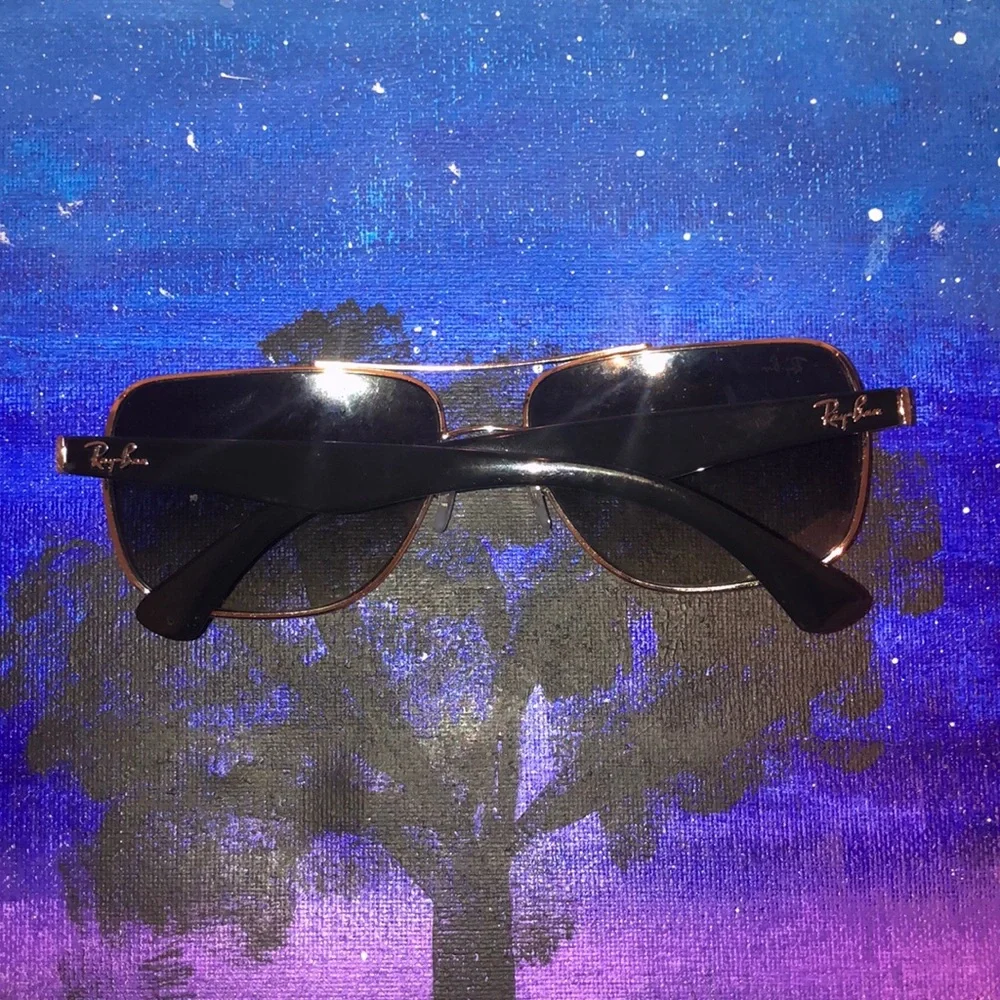 Ray-Ban worn three