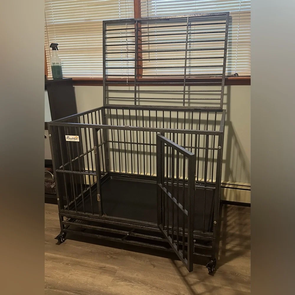 Grey Pawhut heavy duty dog kennel.