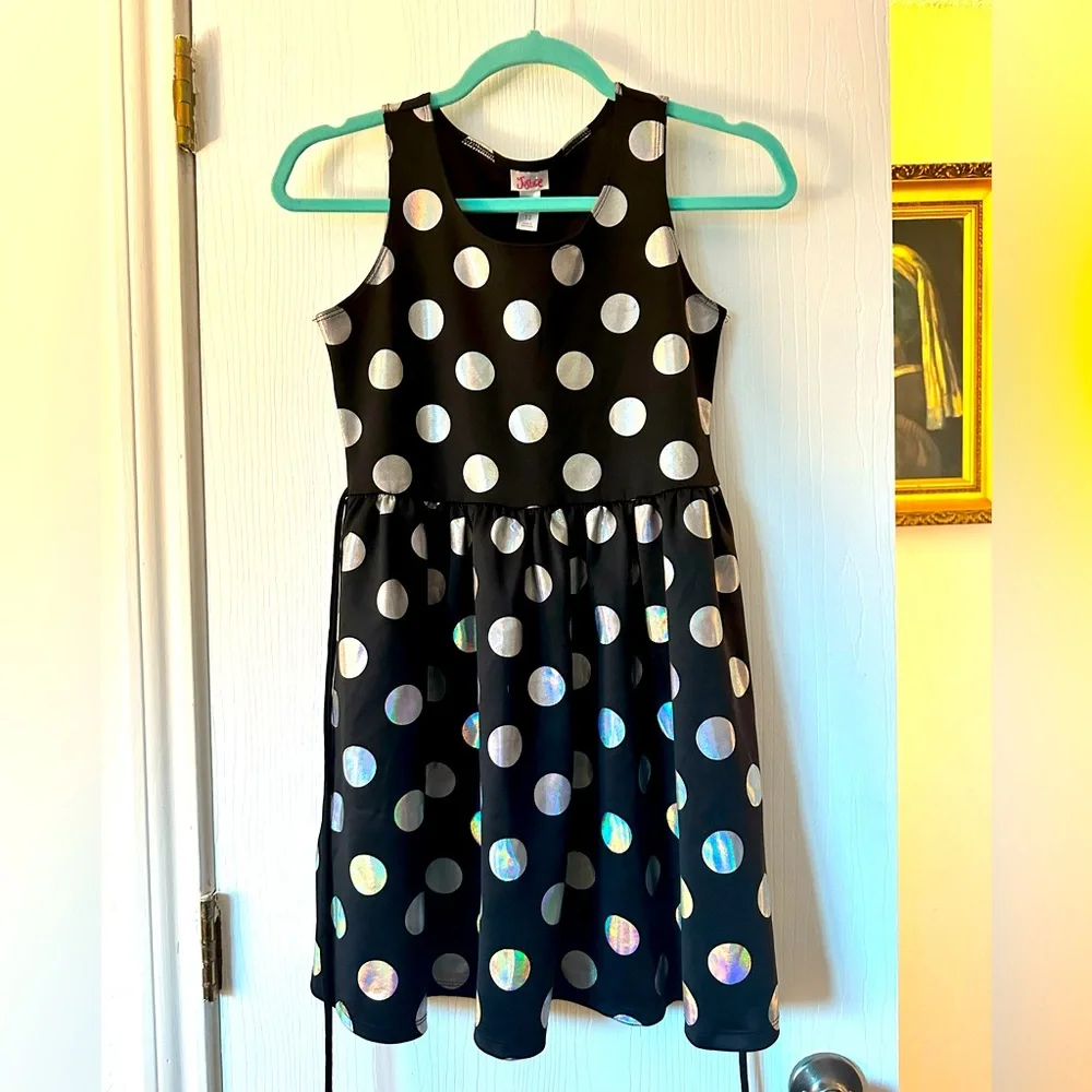 Justice skater dress- black with large silver polka dots. Size 12