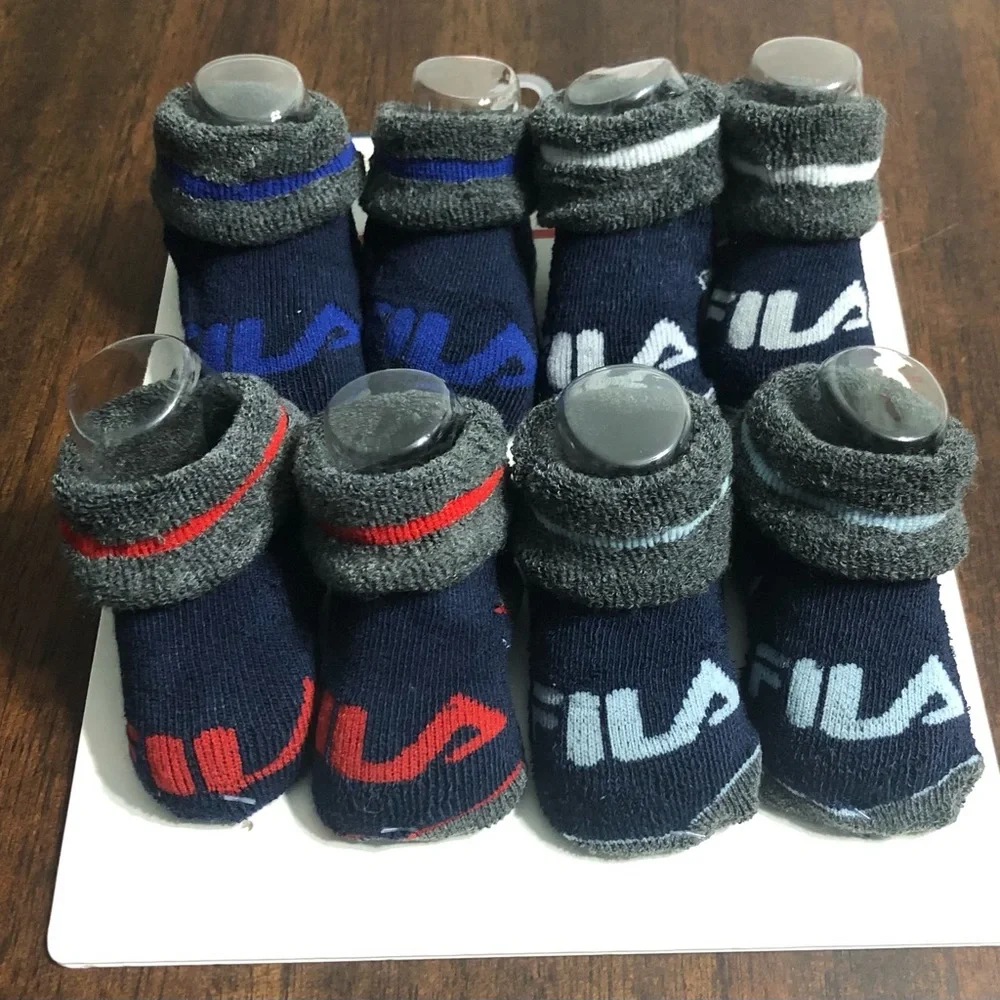 Fila 4 Pairs Baby’s booties socks blue. Size 12-18months