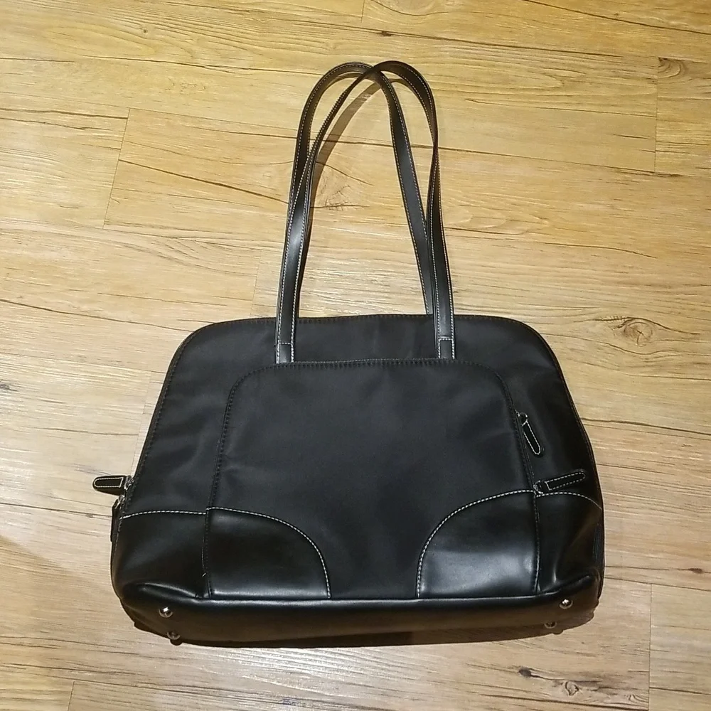 Computer tote w/ many storage area padded for computer