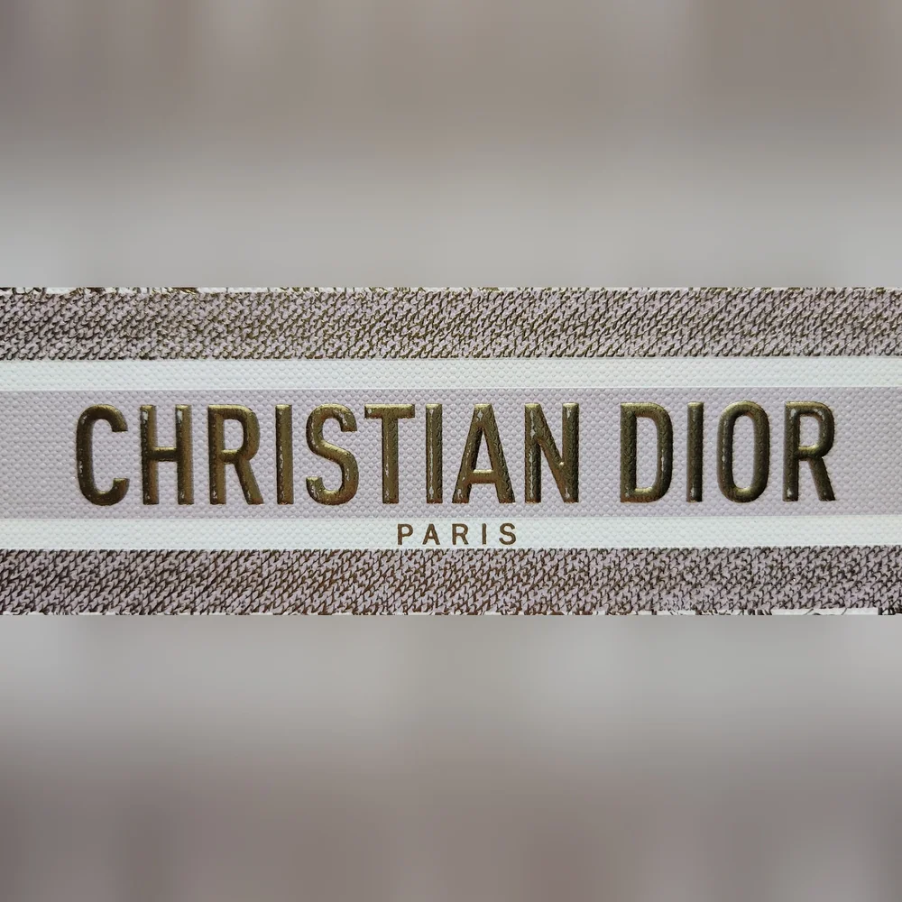 Dior gold embossed