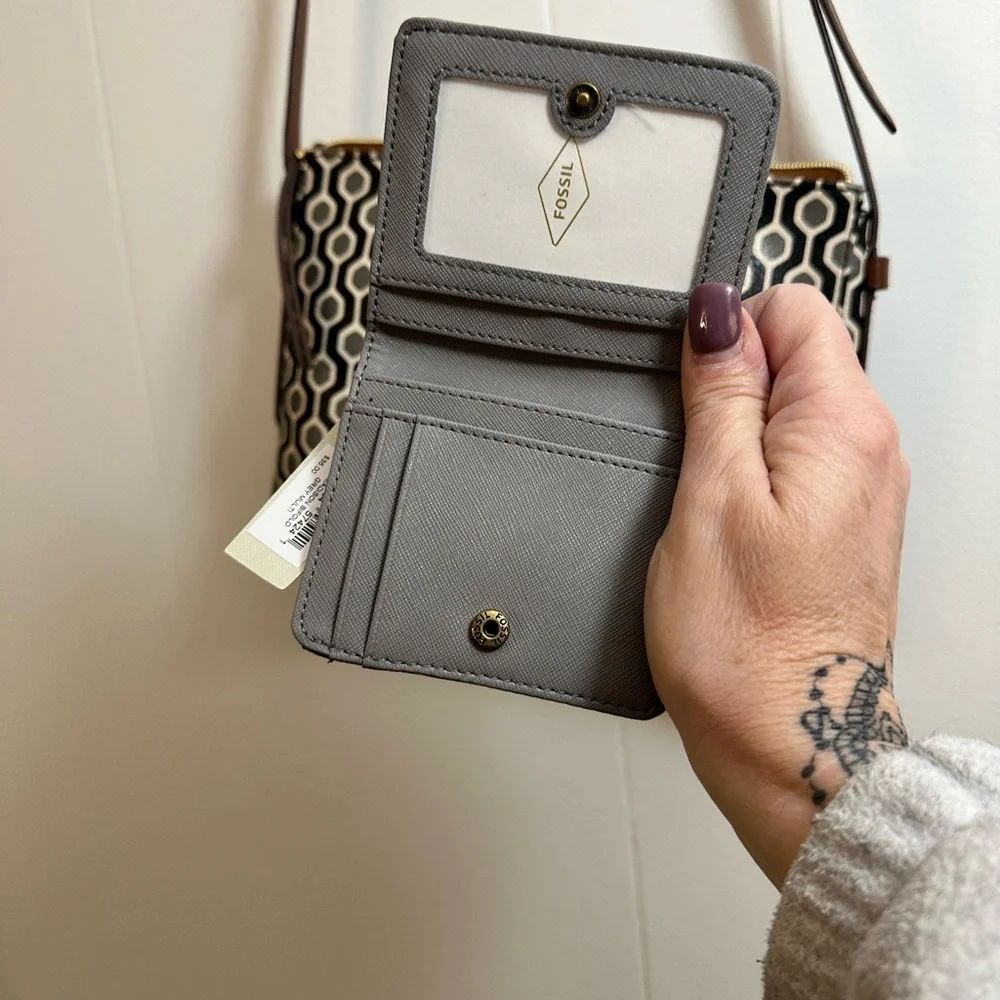 Fossil 2 pc crossbody and new wallet still has tags on the wallet