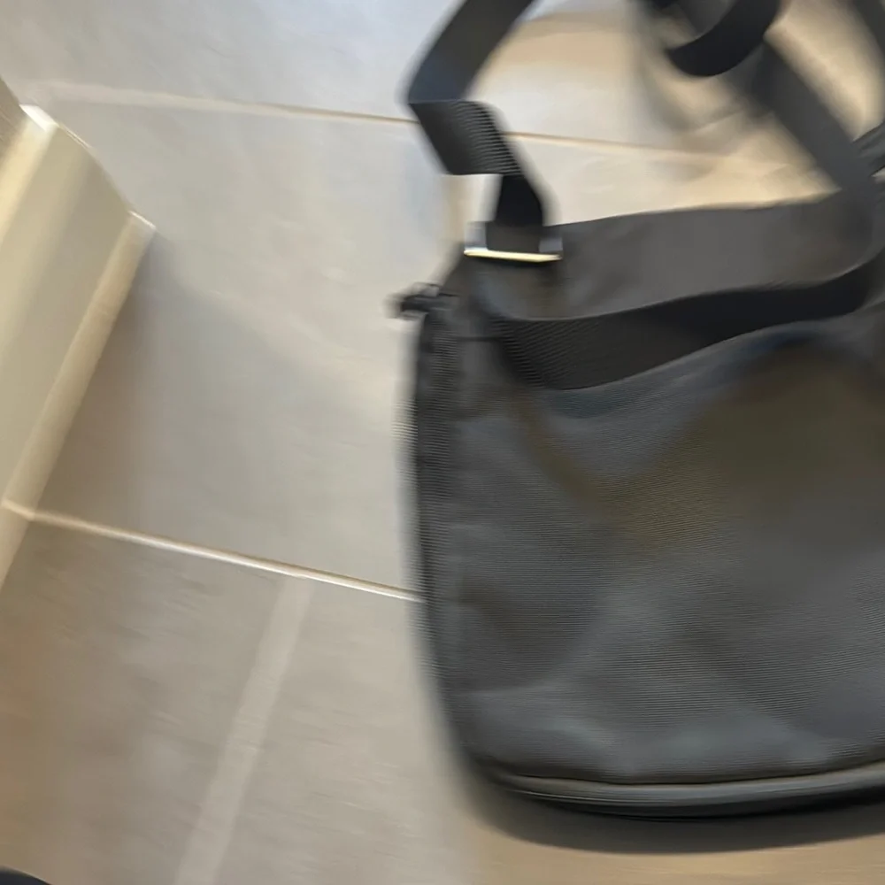 Tumi black messenger