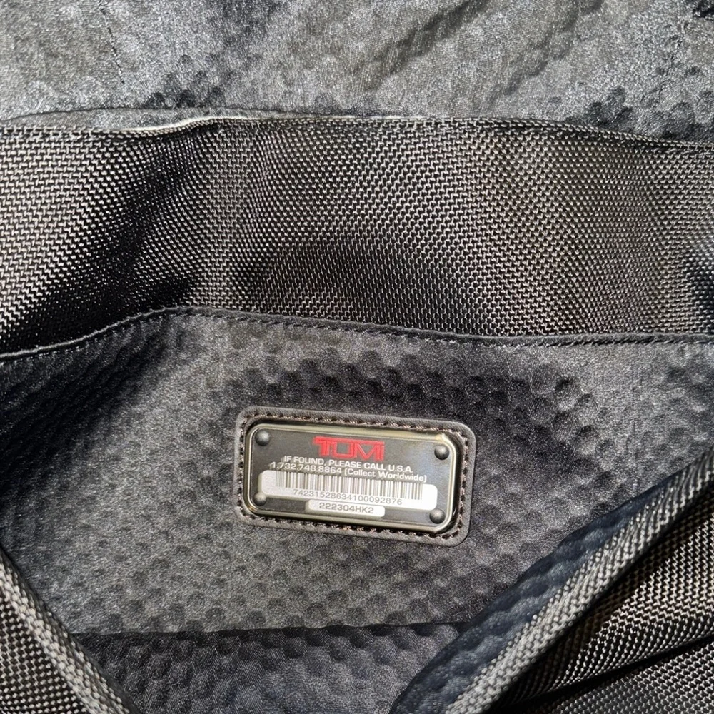 Tumi black messenger