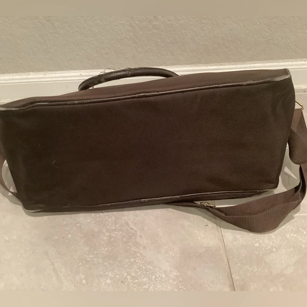 Paco Rabanne Brown Duffel Bag with Structured Design and Top Handles