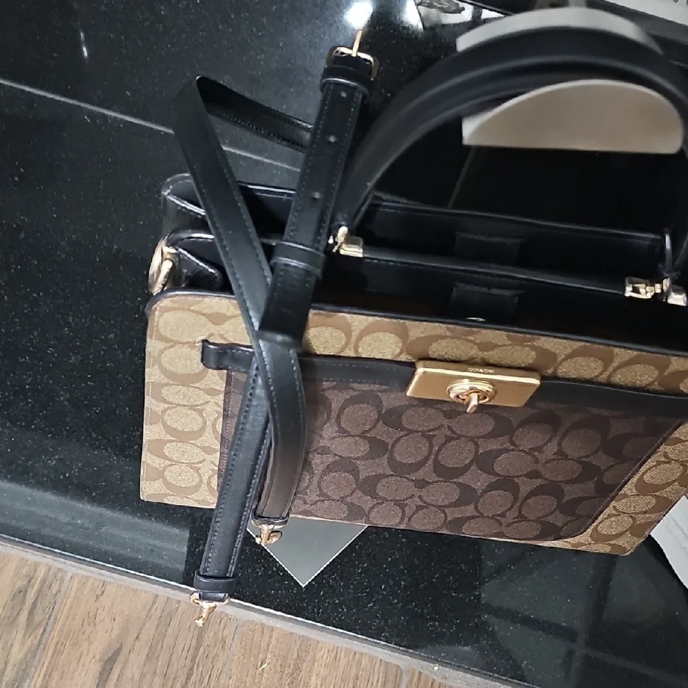 Coach crossbody strap secure