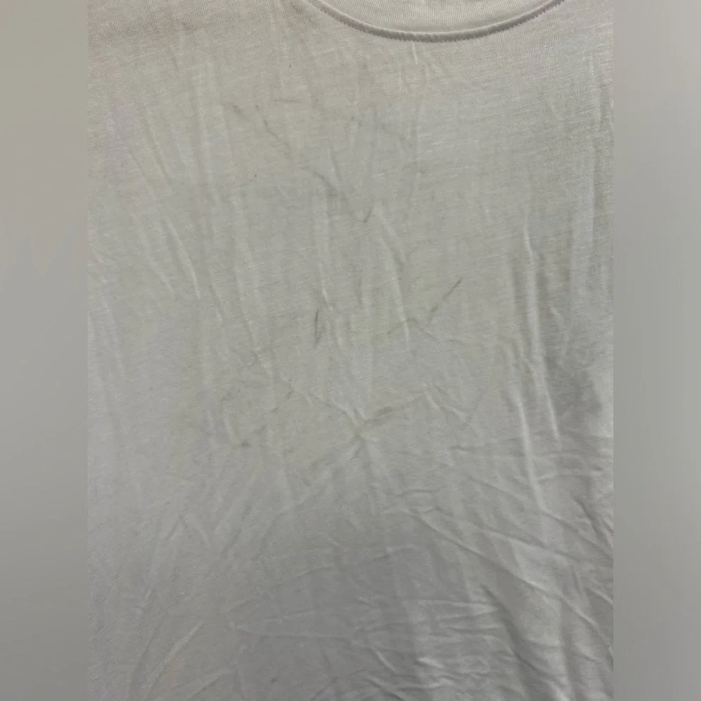 2 new white Terez tops with some light flaws. Girls size XL tie & cross fronts