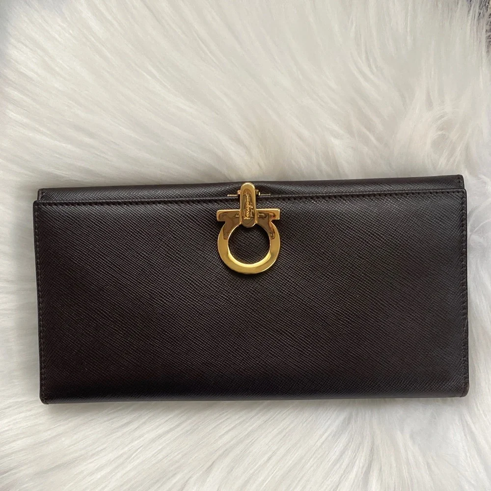 Salvatore Ferragamo Deep brown leather wallet with gold accent