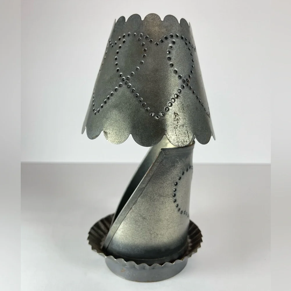 Vintage punched tin tea light candle holder