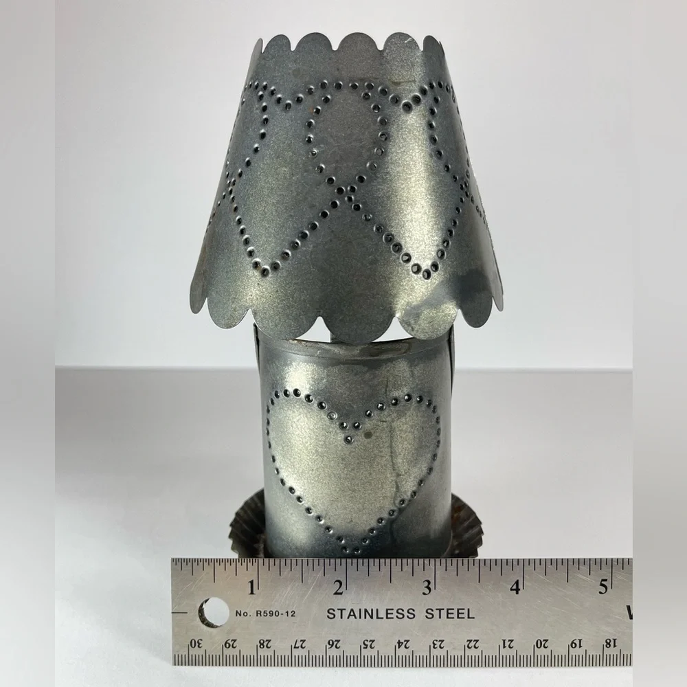 Vintage punched tin tea light candle holder