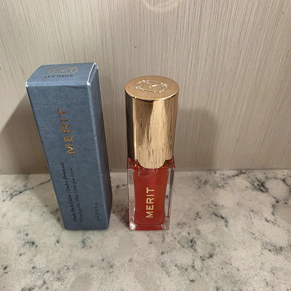 Merit Shade Slick Gelée Tinted Lip Oil in the shade 