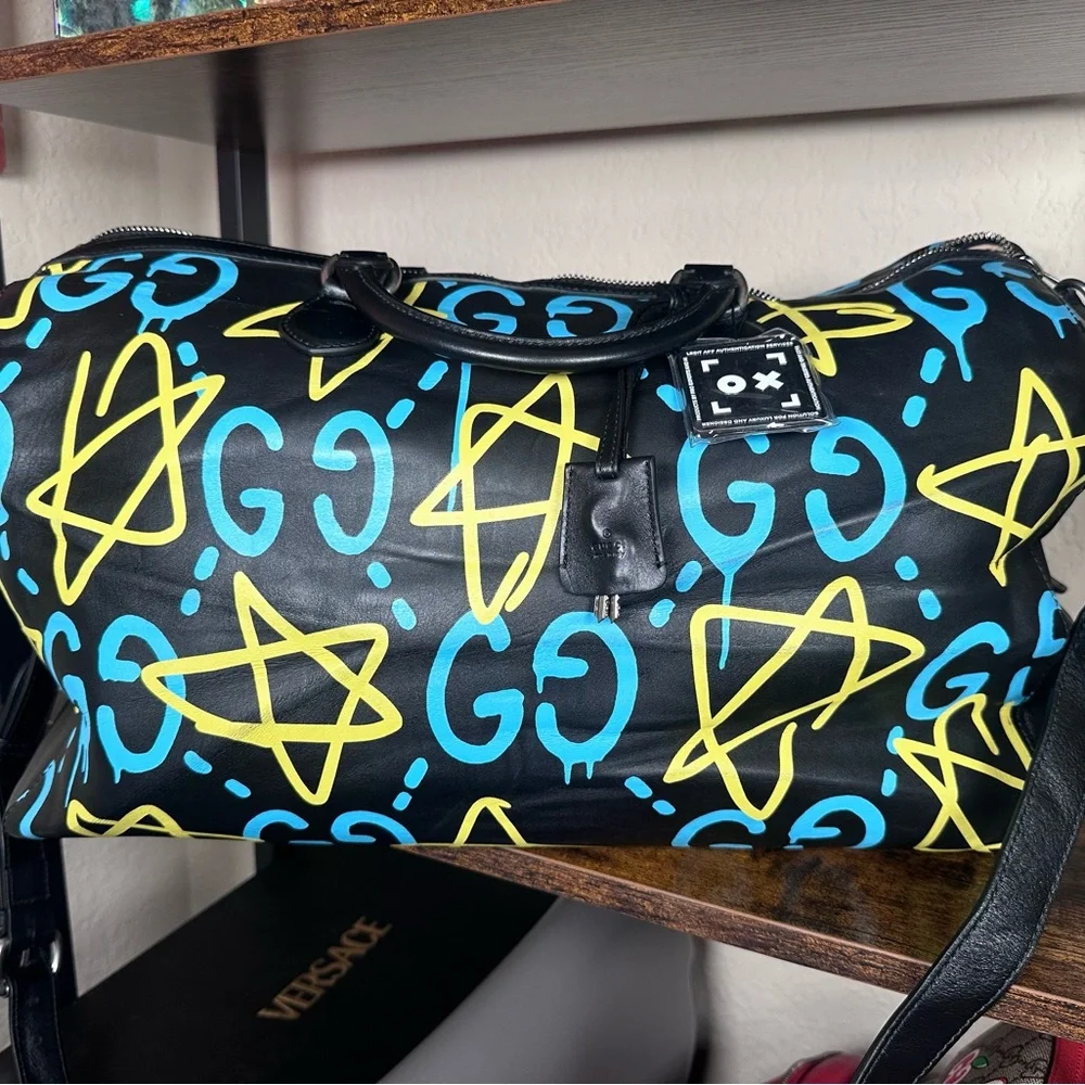 Authentic Gucci Ghost Black and Yellow Graphic Duffel Bag