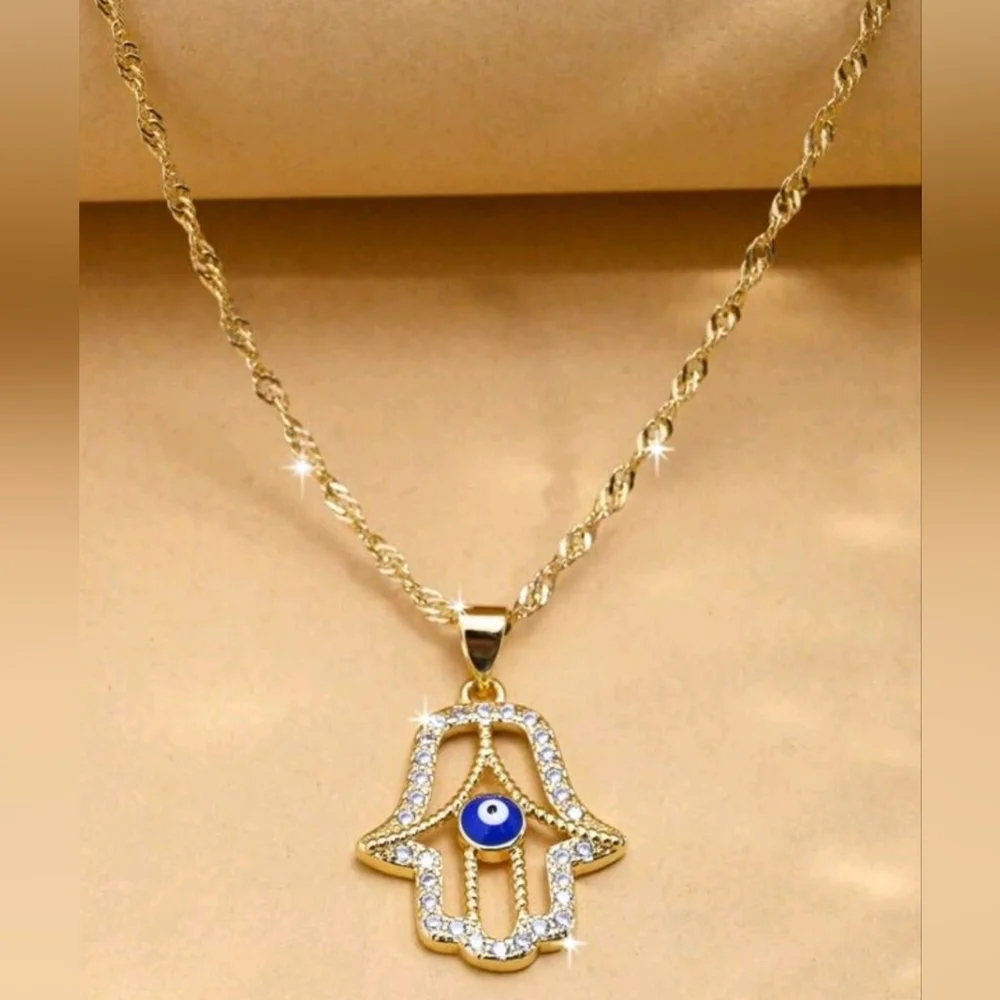 hourglassaccess hamsa hand