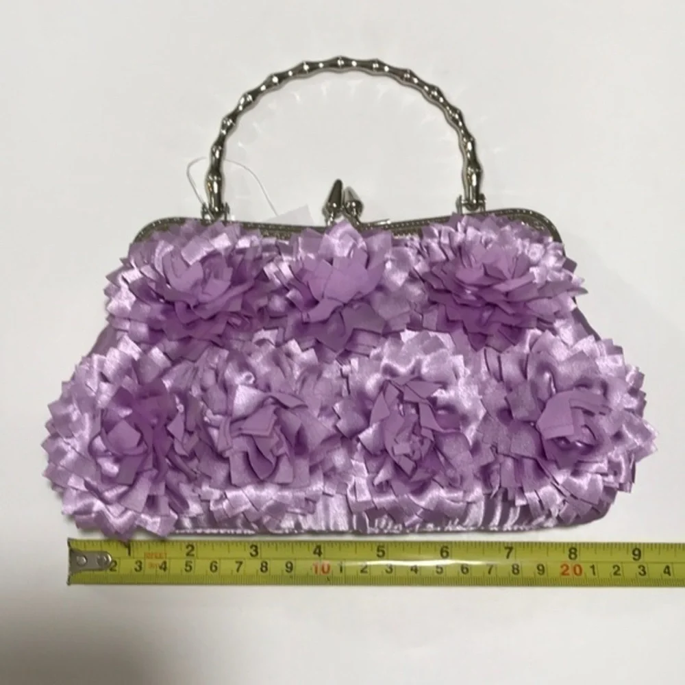 BellaKiara purse light approximately