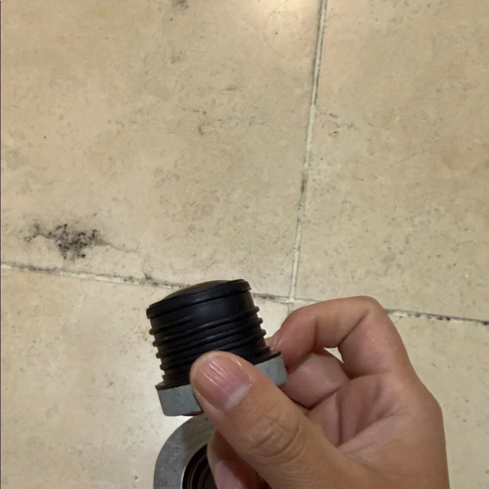 Kith charcoal bottle