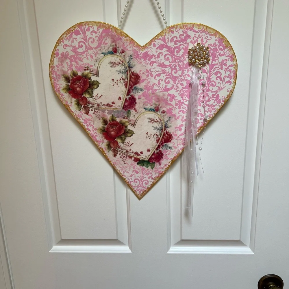Elegant Pink Heart Wreath with Red Floral Design