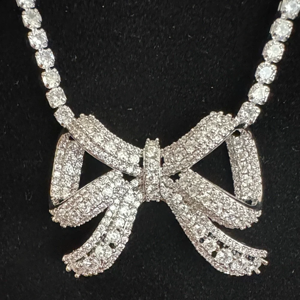 Camila Coelho Elegant Silver color Bow Necklace