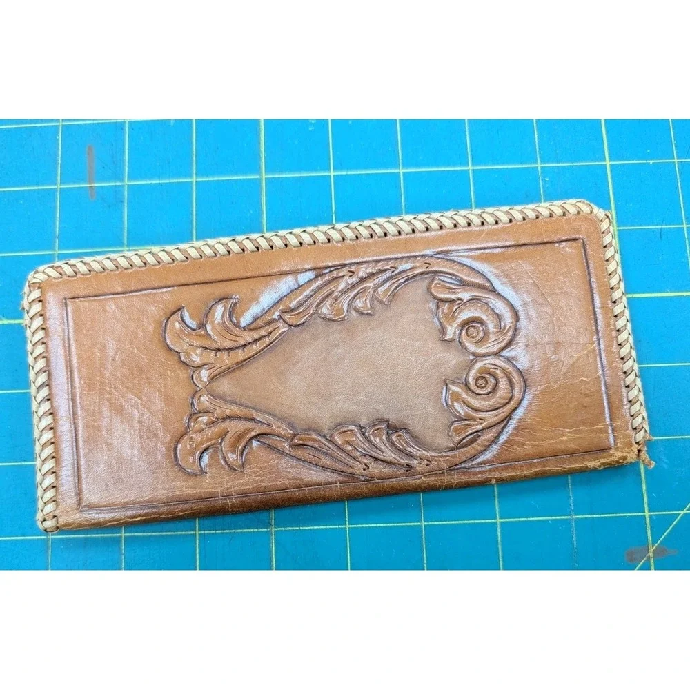 The Unbranded Brand leather tooled