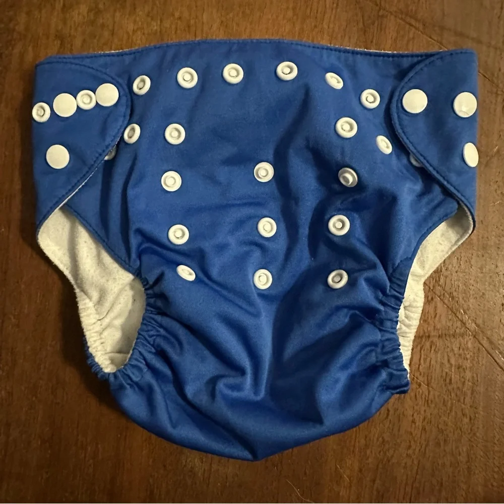 Nora’s Nursery Nautical Reusable Pocket Cloth Diaper Set of 4 adjustable size.