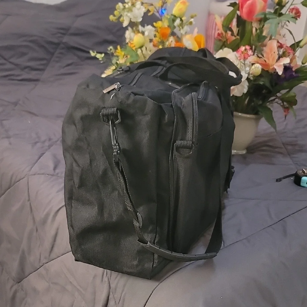 American Tourister black organized