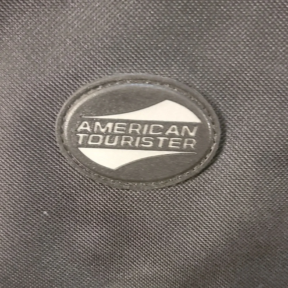 American Tourister pockets samsonite organized