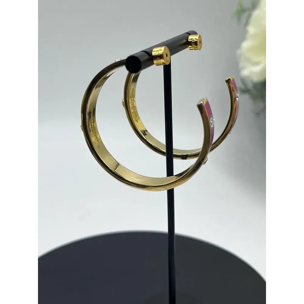 Kurt Geiger earrings tone