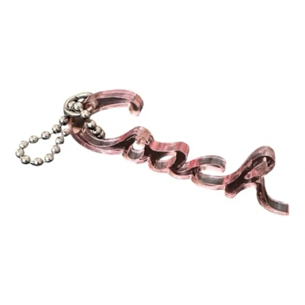 Coach pink resin