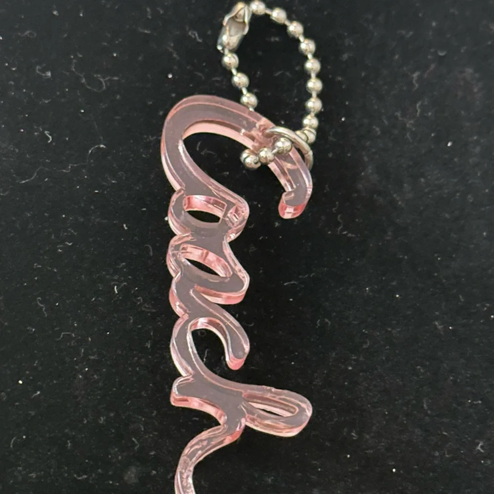 Coach pink resin