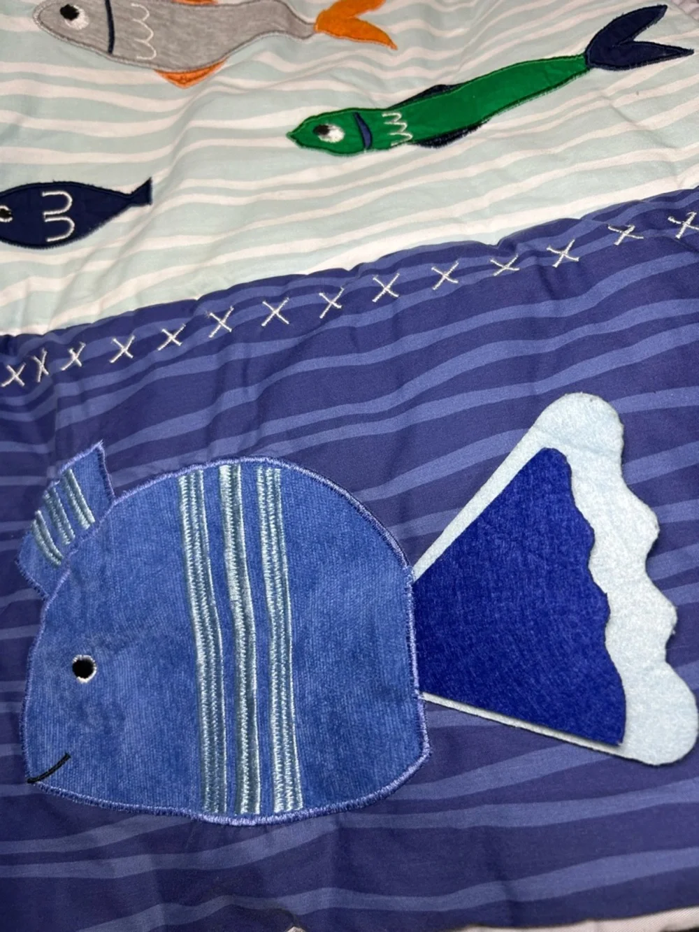Lambs & Ivy quilt features