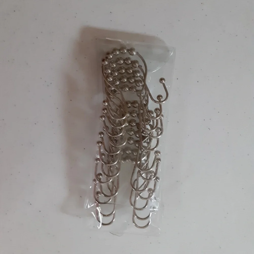 Unbranded silvertone curtain hooks