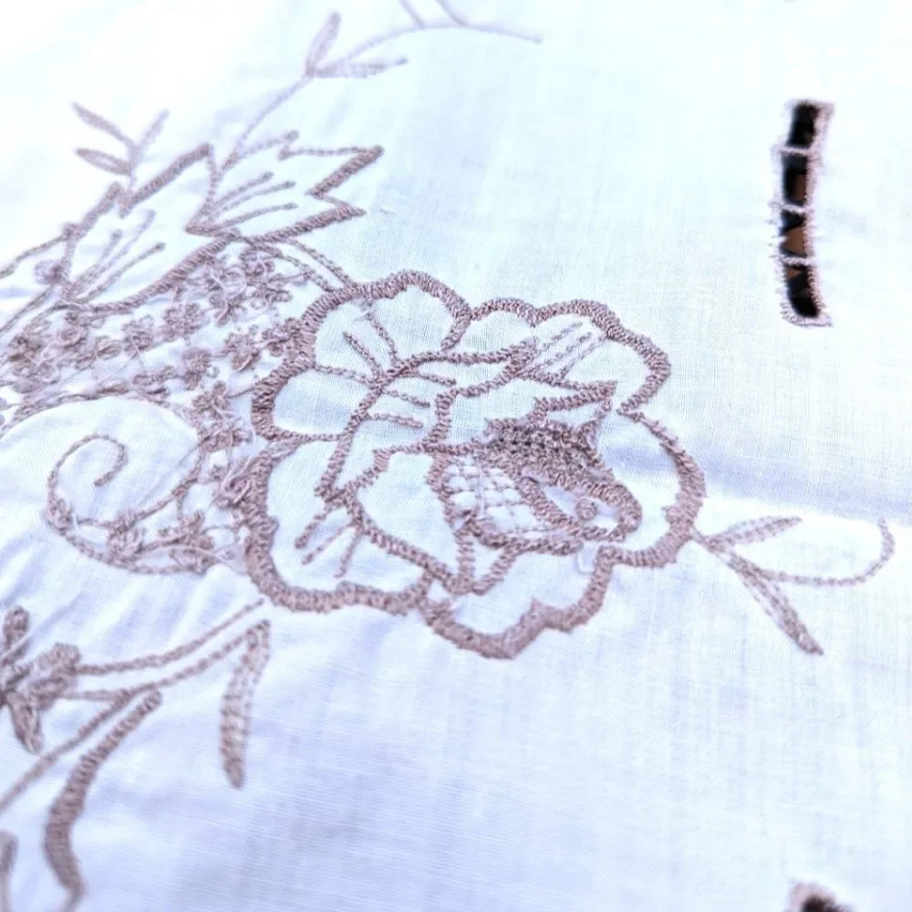 N/A featuring embroidery