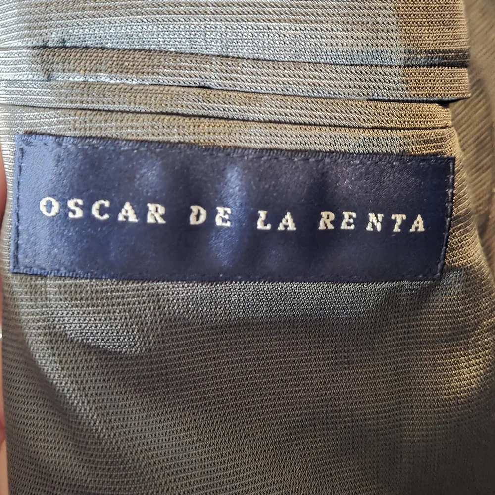 Oscar de la Renta elegant dark