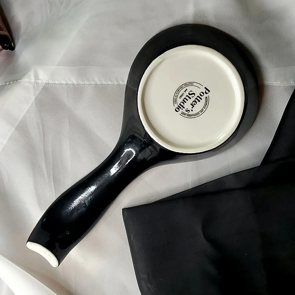 N/A white spoon