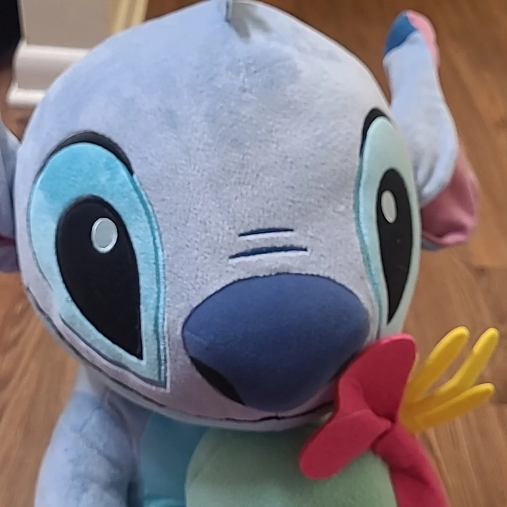 Disney Blue and‎ Pink Stitch Plush with Green Doll used good condition.