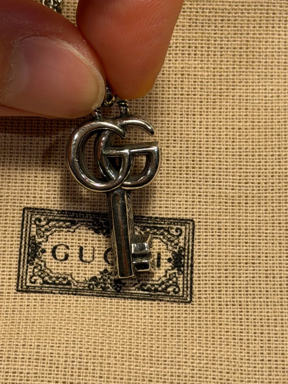 Gucci key pendant