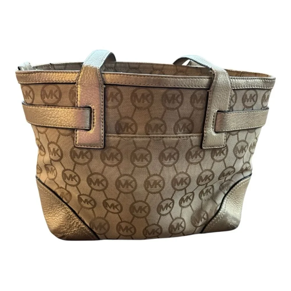 Michael Kors Small Monogrammed Leather Tote featuring the brand's signature logo