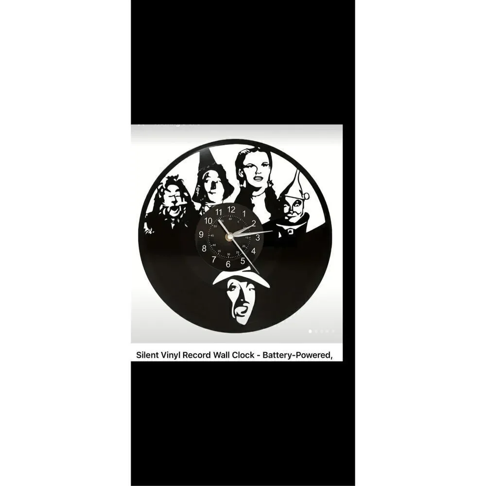 The Wizard of Oz 12”Black Lp wall clock . Battery operated .