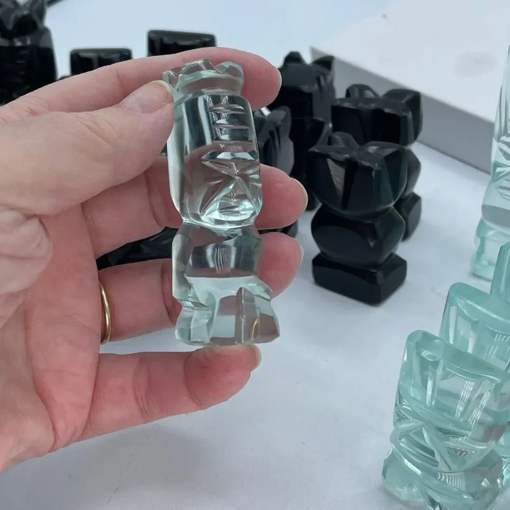 Aztec style chess pieces black obsidian green glass or onyx.