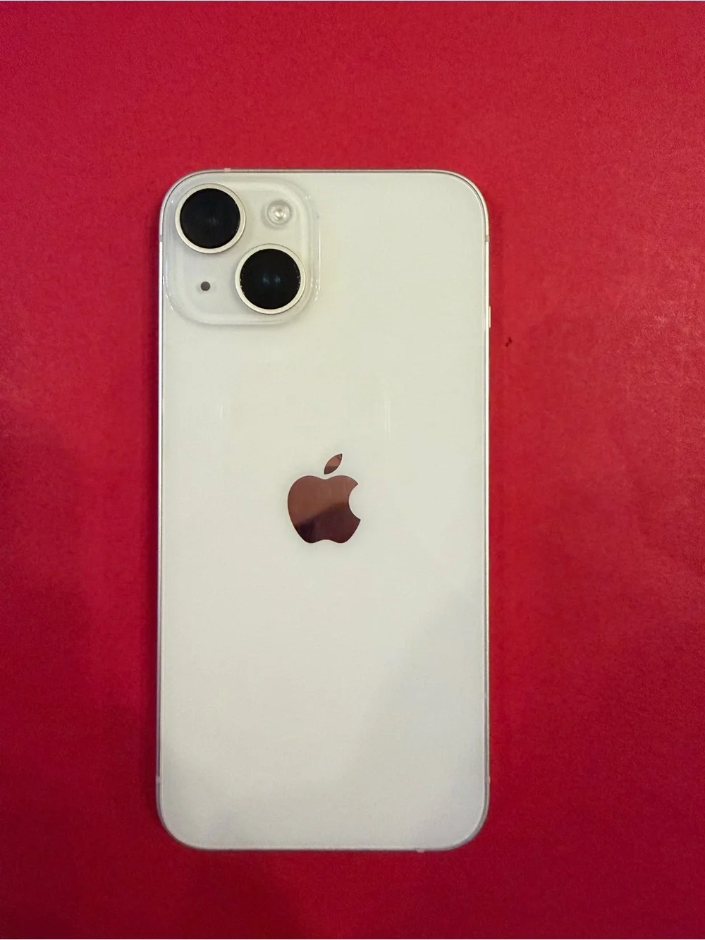 Apple iPhone White with Dual Rear Cameras and Apple Logo