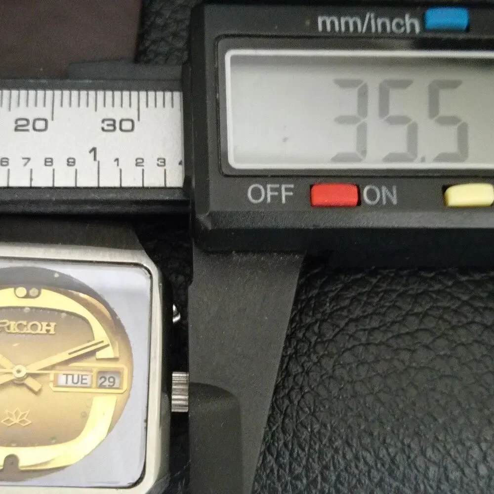 Ricoh this watch