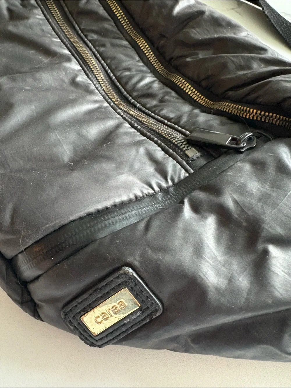 Caraa Black Quilted Puffer Bag with Gold Hardware