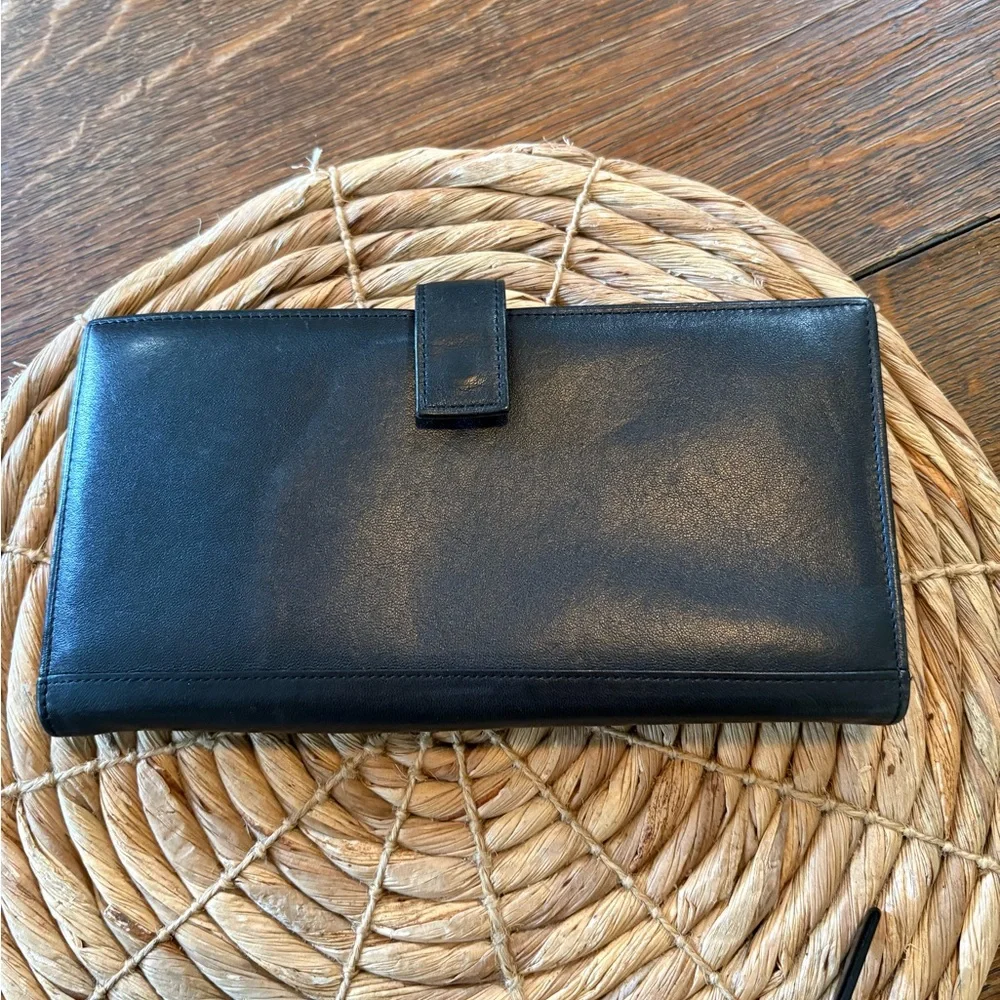 Tumi travel wallet passport card organizer.