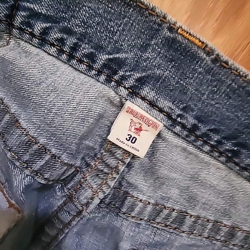 True Religion used featuring design