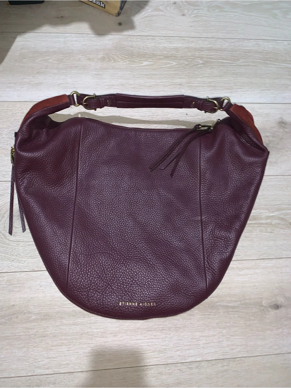 Etienne Aigner bag price tear
