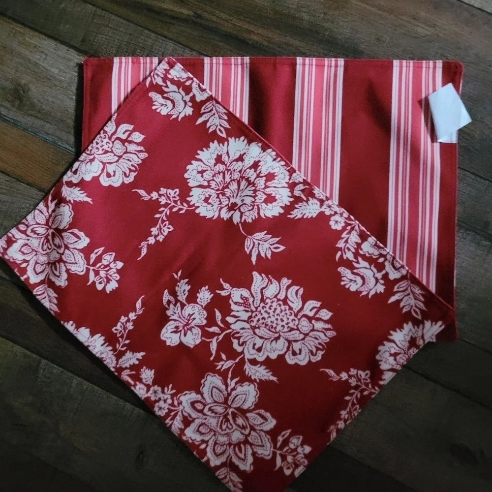 2 red and white place mats.