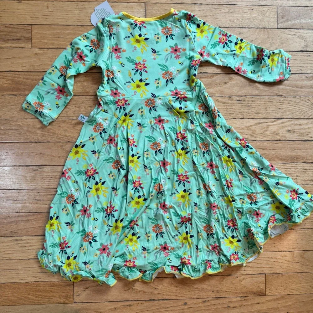 Pure Bambinos green spinning dress