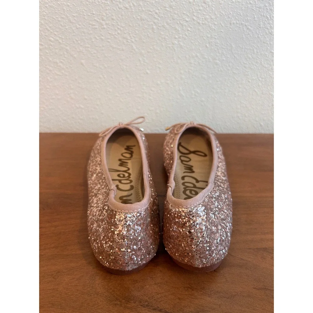 Sam Edelman gold topline logo