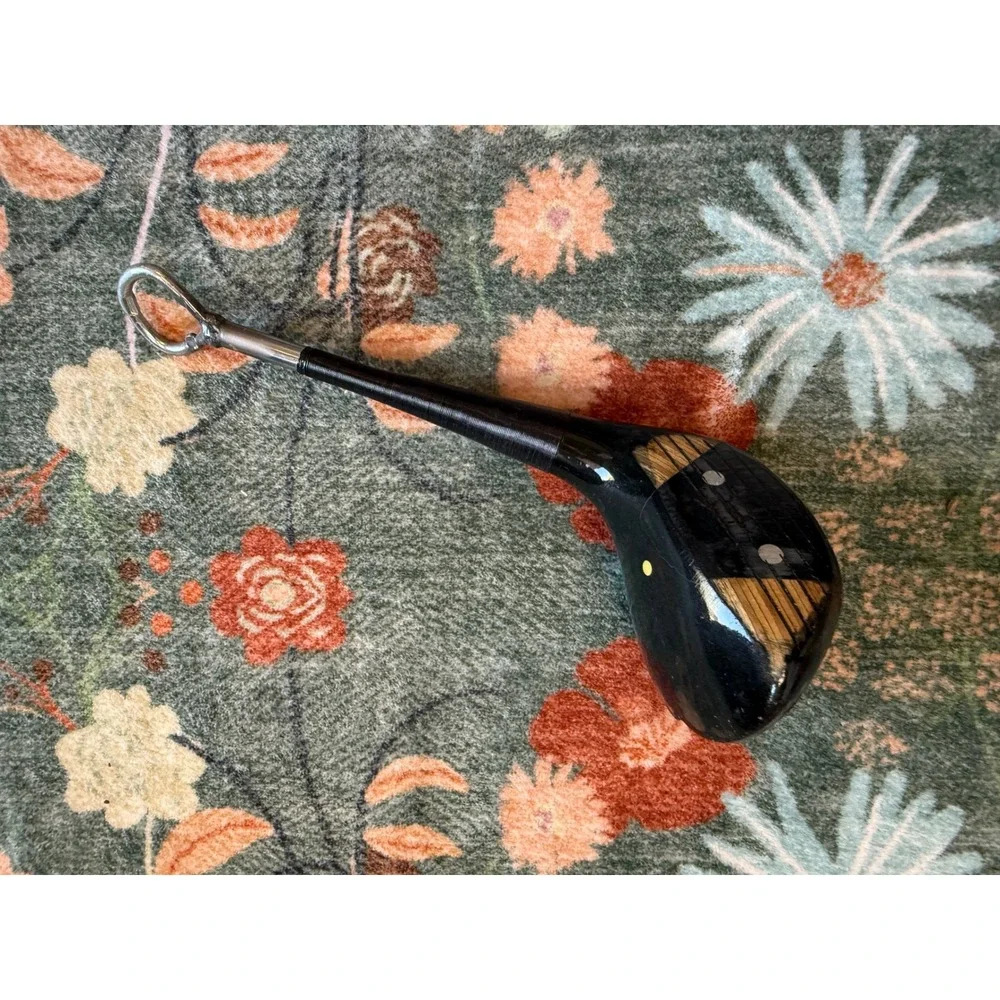 Titleist brass or professionally